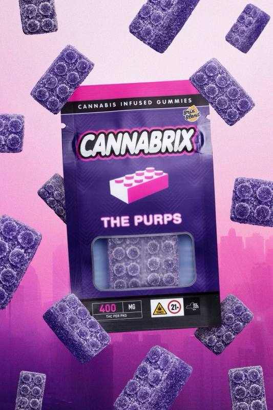 The Purps (Mixed Berry) | Cannabrix gummies – 400mg 1 Cannabrix The Purps cannabis-infused gummies with 400mg THC, displayed against a vibrant pink and purple background.