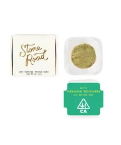 Natural bubble hash collection featuring Pineapple Tropicanna and Stone Road packaging, Sativa strain.