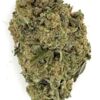 Close-up of a dense, green cannabis bud with visible trichomes, highlighting its texture and color.