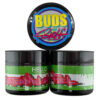 Cannabis jars labeled Watermelon Fuel and Buds and Such, with colorful branding.