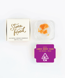 Stone Road Lemon Berry Haze cannabis concentrate with packaging on a white background.