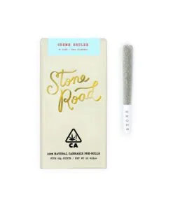 Stone Road Creme Brulee cannabis pre-roll packaging with joint on white background.