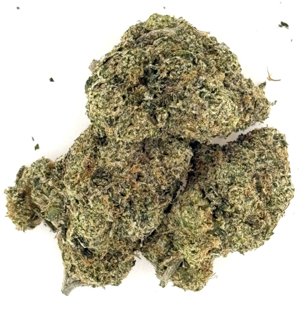 Close-up of premium cannabis buds showcasing rich green hues and dense trichome coverage. Ideal for relaxation and enjoyment.
