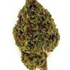 Close-up of a cannabis bud showcasing vibrant green colors and dense texture, perfect for strain identification.