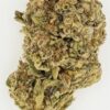 Close-up of green cannabis bud with visible trichomes and texture, highlighting its quality and freshness.