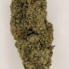 Close-up of a dense cannabis bud with vibrant green hues and a frosty appearance, ideal for medicinal or recreational use.
