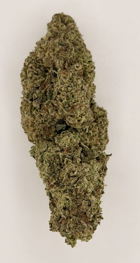 Close-up of a dense cannabis bud with vibrant green hues and a frosty appearance, ideal for medicinal or recreational use.