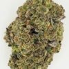 Close-up of a green cannabis bud, showcasing trichomes and rich texture, perfect for herbal enthusiasts and medicinal use.