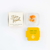 Alt text: Stone Road cannabis concentrate packaging with Lemon Jack sativa sugar in a clear container.