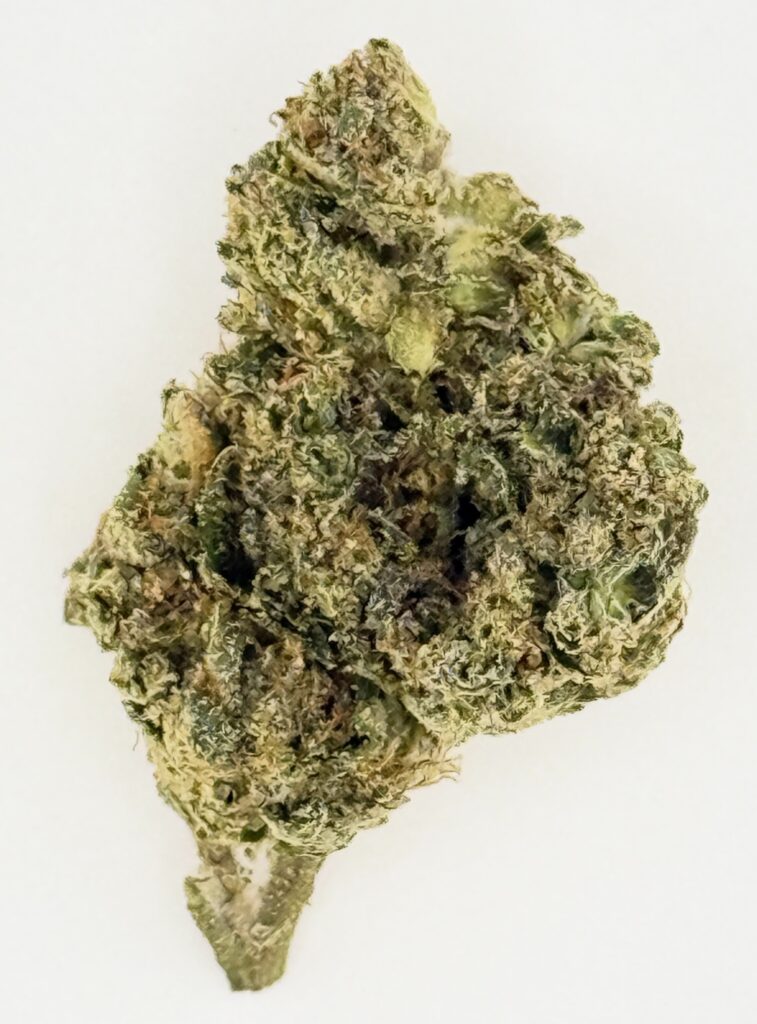 Close-up of a cannabis bud showcasing its dense, frosty trichomes and vibrant green hues on a white background.