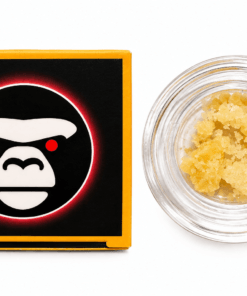 Close-up of a cannabis concentrate jar beside branded packaging featuring a stylized gorilla logo.